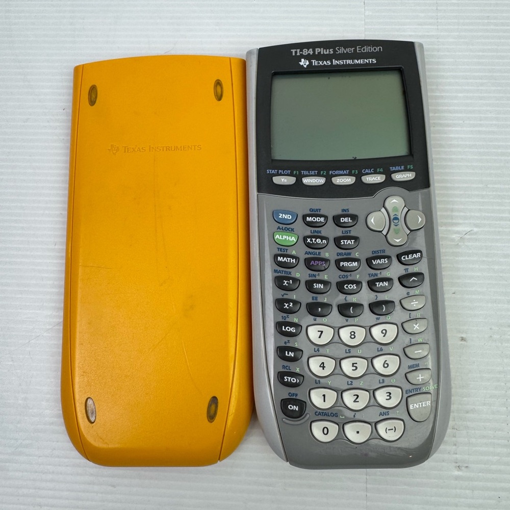 Texas Instruments TI 84 Plus Graphing Calculator W Cover Working Tested
READ